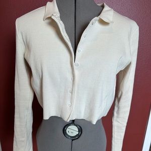 Cream/white, ribbed knit, collard, button up, long sleeve, crop top.